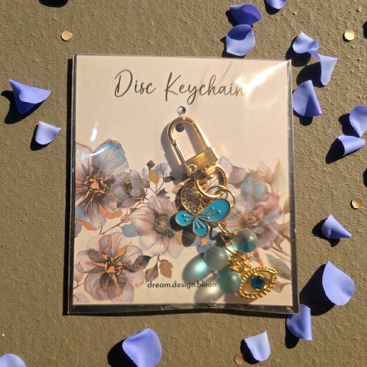 Azure Blooms long disc key charm by dream.design.bloom, blue discbound planner accessory with boutique gem detailing