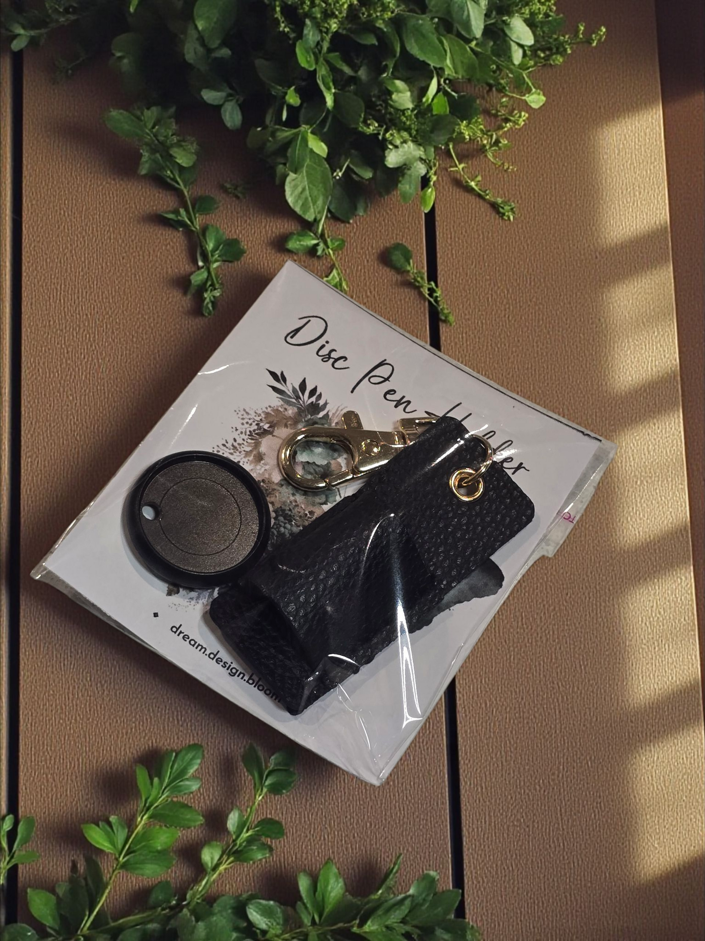 Packaged Disc Pen Holder by dream.design.bloom in black, boutique discbound planner accessory with coordinating disc