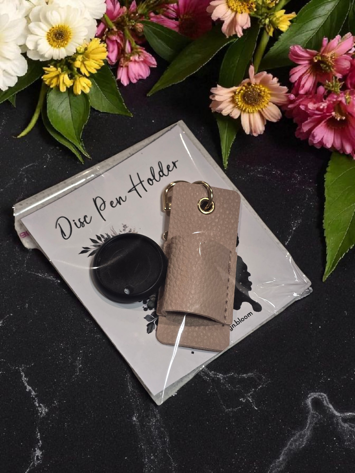 Packaged Disc Pen Holder by dream.design.bloom in pink, boutique discbound planner accessory ready for shipment