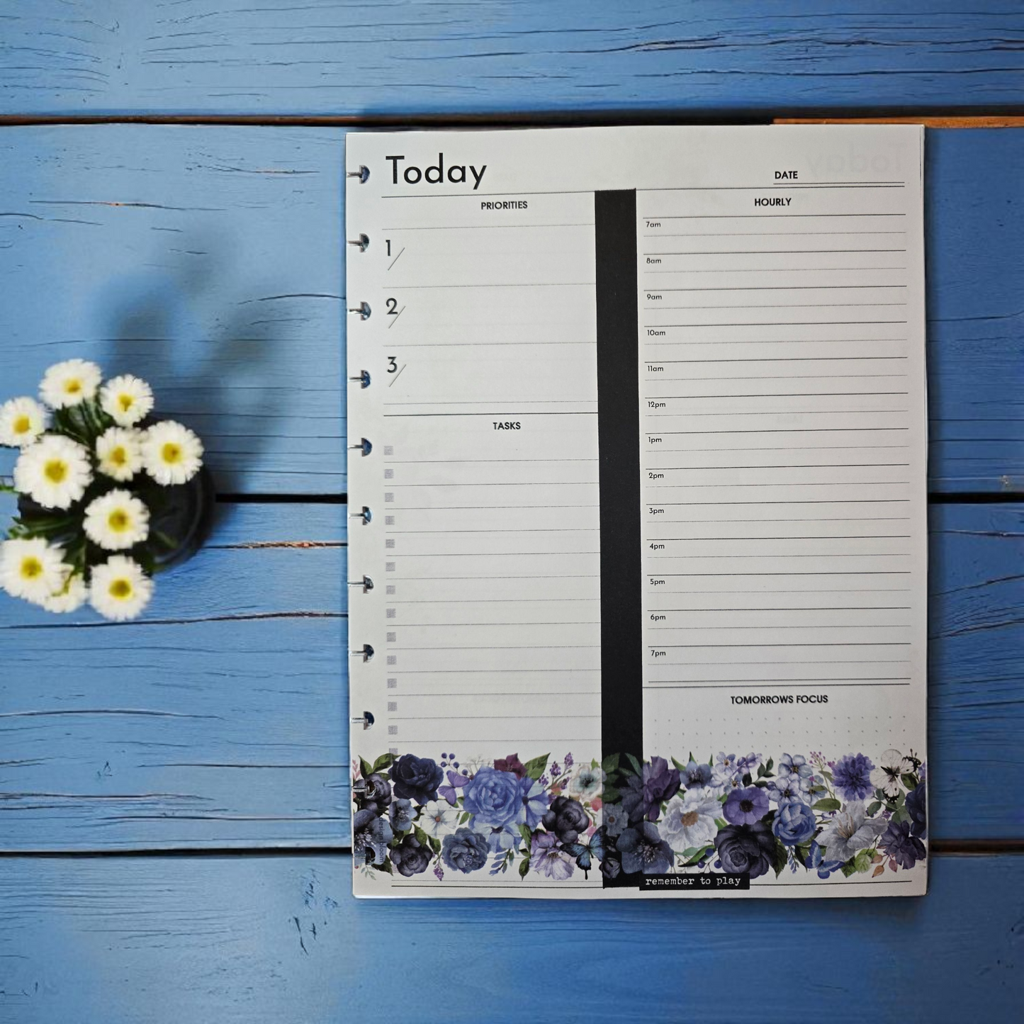 flatlay of Azure Blooms discbound today planner inserts with coordinating planner accessories