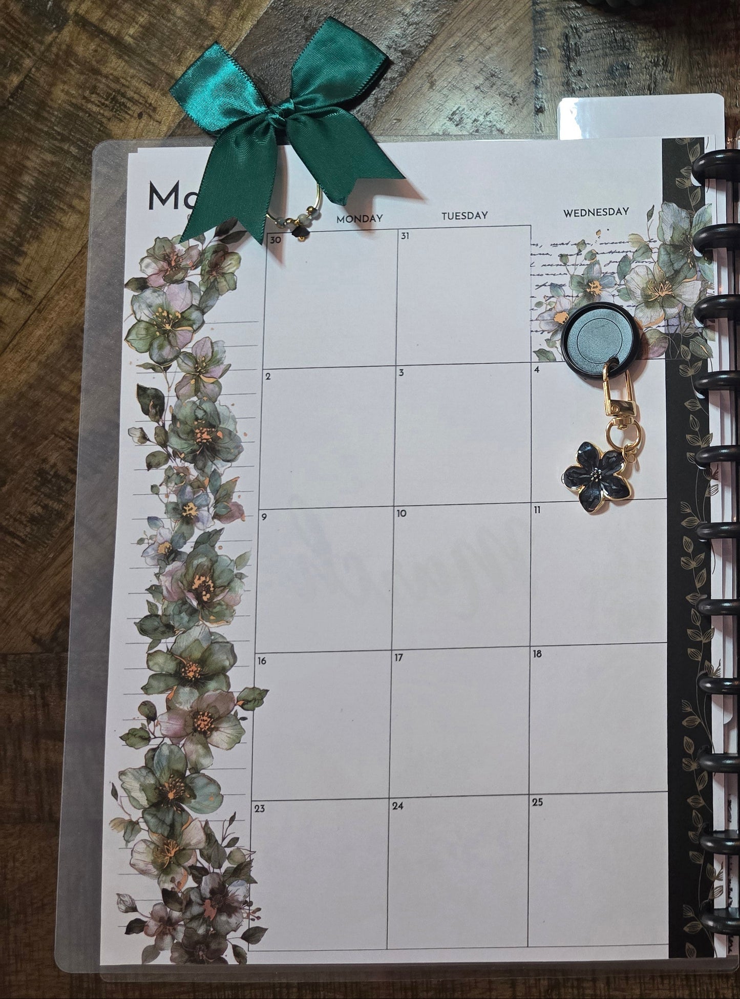 Large Paperclip with Bow in Arbor Designs palette by dream.design.bloom clipped onto discbound planner page, showing boutique functional use