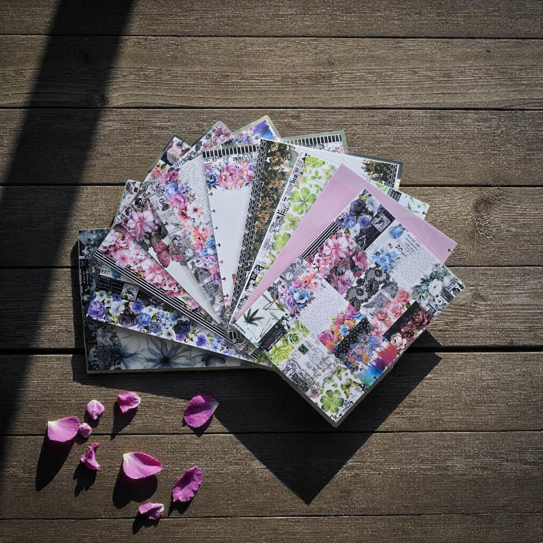 flatlay of discbound planner covers collection by dream.design.bloom featuring Whisper Dreams, Azure Blooms, Arbor Designs, Celestial Blooms and Plain