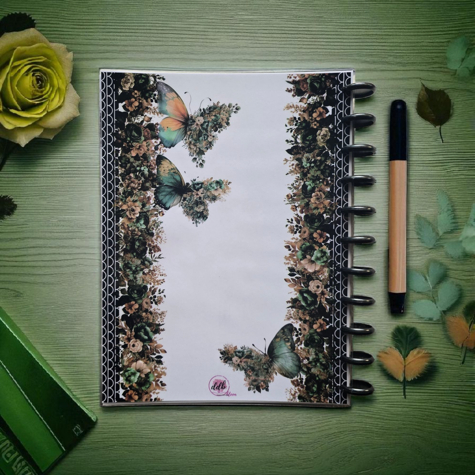 back cover of Arbor Designs 2026 discbound monthly dated planner in natural green palette