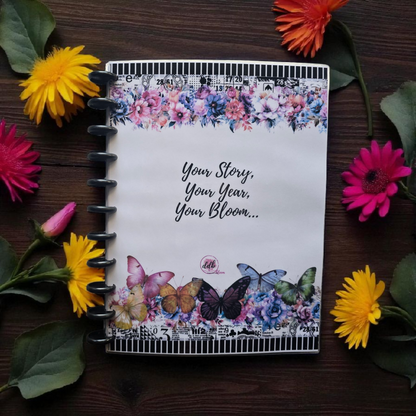 front cover of Celestial Blooms 2026 discbound monthly dated planner in rainbow inspired palette