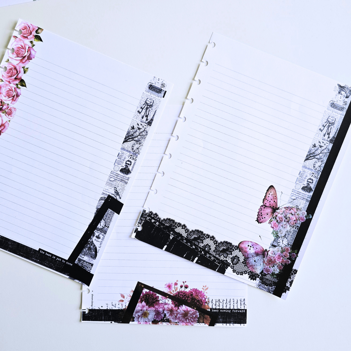Three decorative lined discbound notes inserts arranged on a white background, featuring pink rose borders, black-and-white newspaper print strips, lace-like black borders, and a butterfly motif.