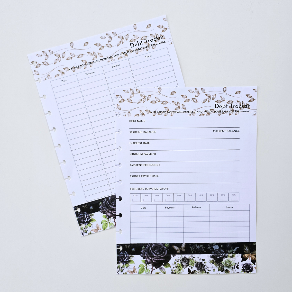 Two discbound debt tracker planner inserts on a light gray background. The inserts feature a white page layout with black text fields, decorated with a gold floral vine border at the top and a black rose floral border at the bottom. Disc Bound Planner. 