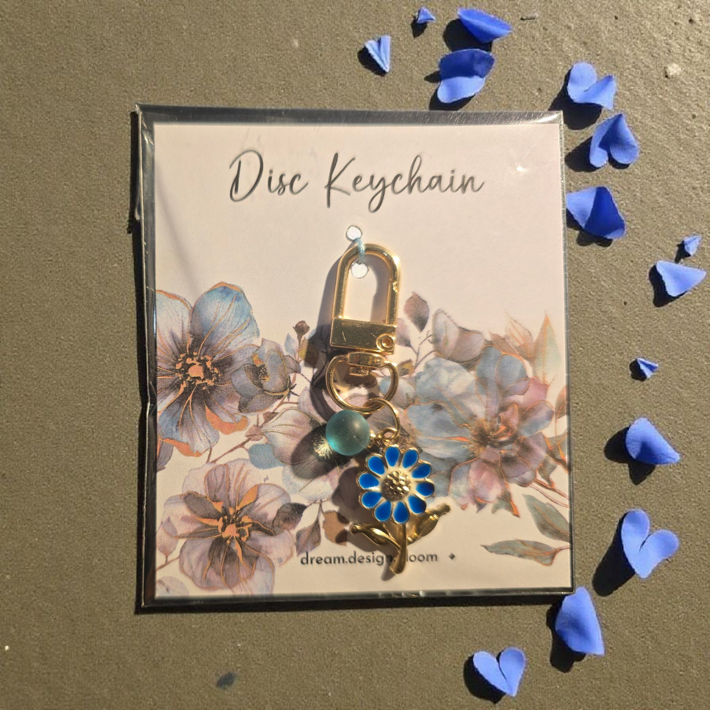Azure Blooms short disc key charm by dream.design.bloom, calm blue discbound planner accessory with ribbon and gold accent