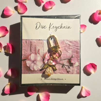 Whisper Dreams short disc key charm by dream.design.bloom, soft pink discbound planner accessory with  gold details