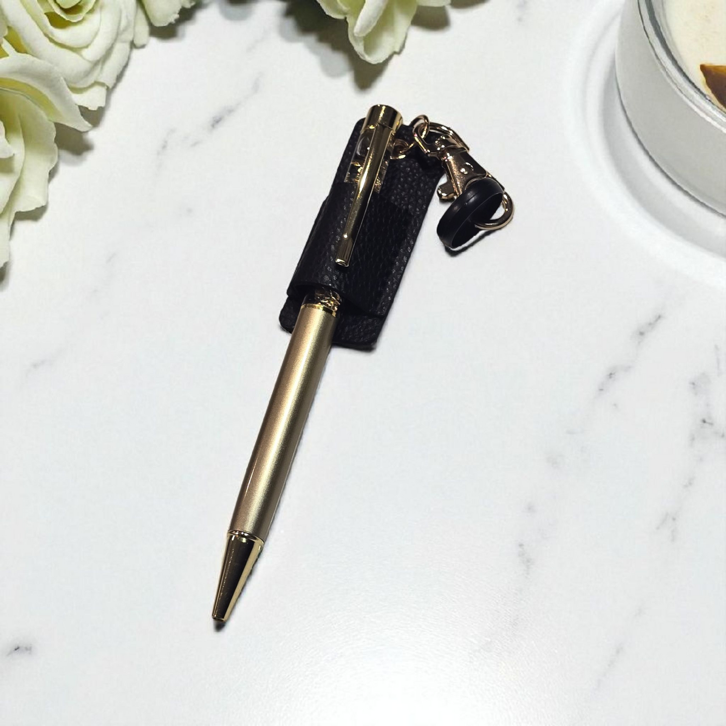 Disc Pen Holder by dream.design.bloom in black, shown holding a pen, boutique discbound planner accessory for stylish organisation