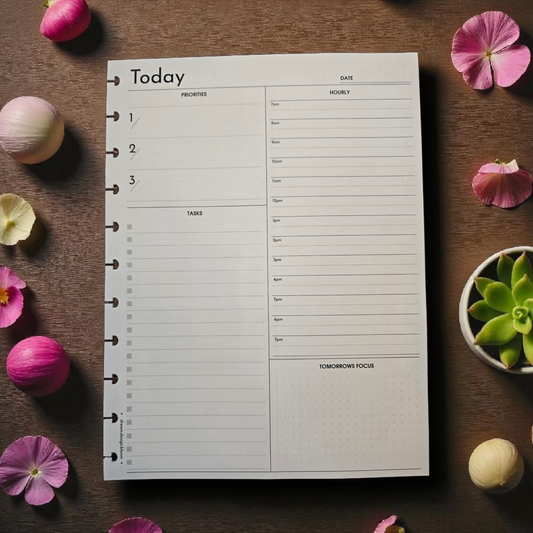 flatlay of Signature Design discbound today planner inserts styled with vibrant rainbow palette accessories