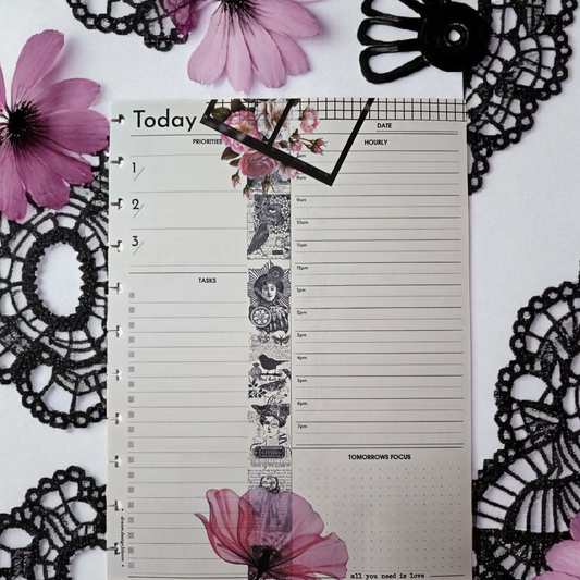 flatlay of Whisper Dreams discbound today planner inserts styled with boutique stationery accessories