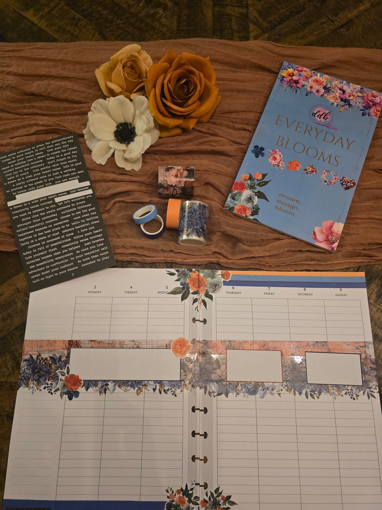 Everyday Blooms Sticker Book discbound planner spread showing decorative florals and pastel boxes for daily planning.