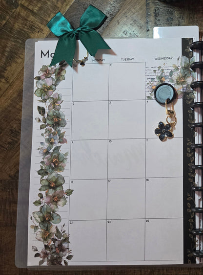 Large Paperclip with Bow in Arbor Designs palette by dream.design.bloom clipped onto discbound planner page, showing boutique functional use