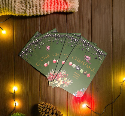 Sticker Book Christmas by dream.design.bloom, flatlay of multiple festive sticker books showing elegant planner sticker covers designed for discbound planners