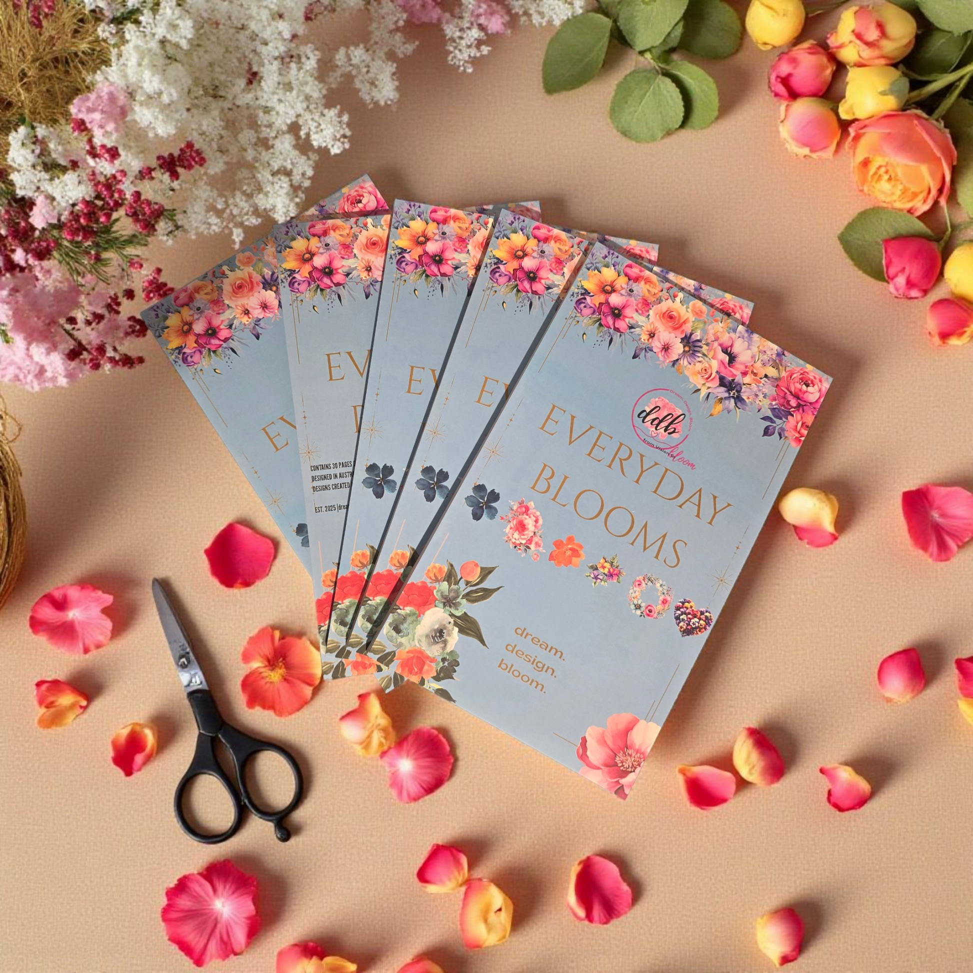 Sticker Book Everyday Blooms by dream.design.bloom, flatlay of multiple boutique sticker books showing coordinated floral covers for discbound planners
